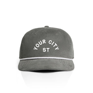 Customizable gray corduroy cap with 'YOUR CITY STATE' text on a white background