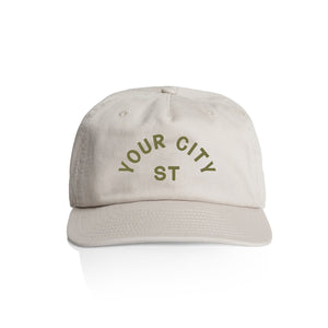 Customizable off white cap with 'YOUR CITY STATE' olive green text on a white background