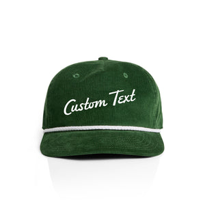 Green corduroy cap with 'Custom Text' on a white background