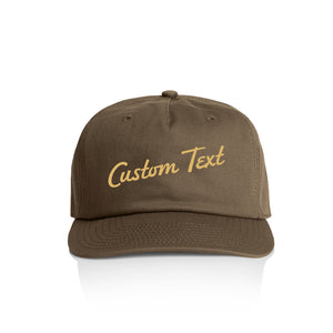 Customizable brown cap with 'Custom Text' in yellow on a white background